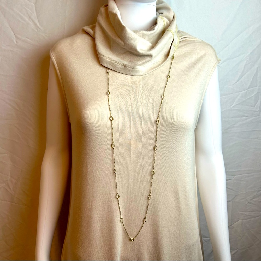 Like New Gold color chain w/ tiny ovals along extra long chain can be doubled up